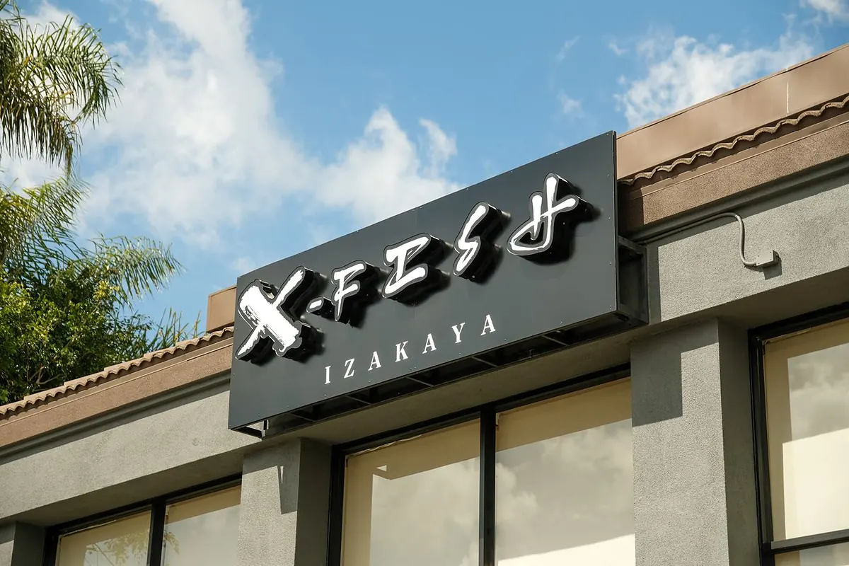 The X Fish sign over the Brea entrance