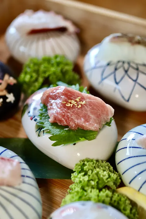 Fatty tuna nigiri with gold leaf