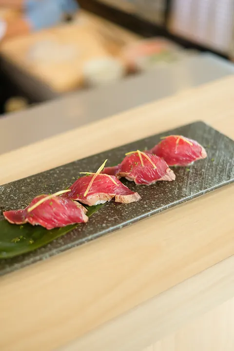Seared nigiri on slate