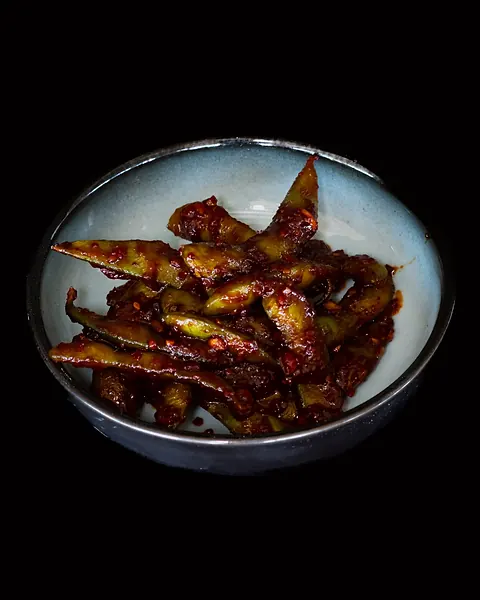 A bowl of small fried fish