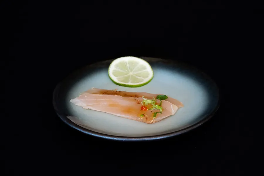Sliced sashimi with lime