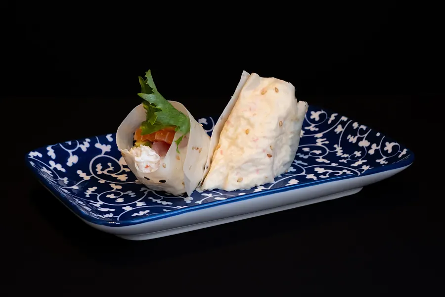 Hand rolls on a blue plate