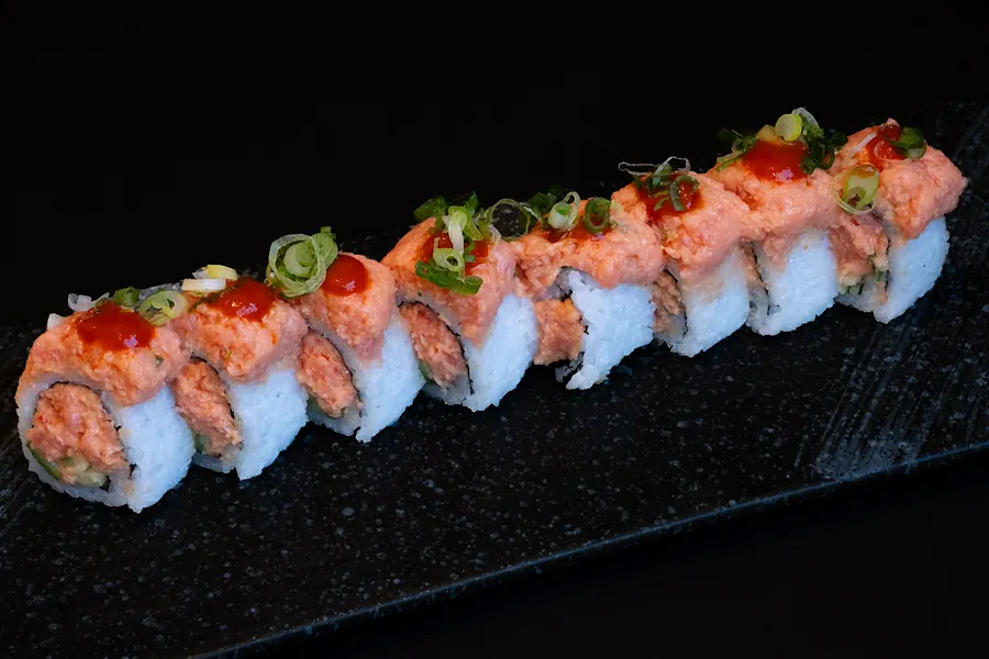 A seared roll with sauce